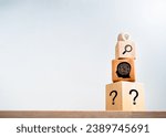 Business solution, creativity, idea plan process, problem solving process concepts. Light bulb icon, magnifier, maze, question mark symbol on wooden cube blocks stack on white background with space.