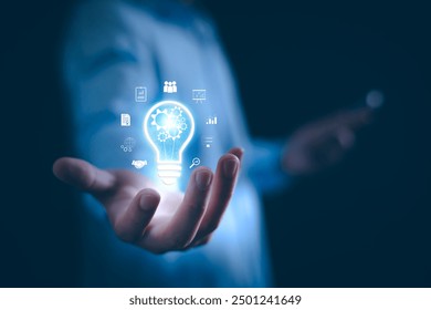 Business solution idea concept. Businessman  creative light bulbs with marketing network, planning strategy, analysis solution and development, modern business technology, Innovative of new idea.