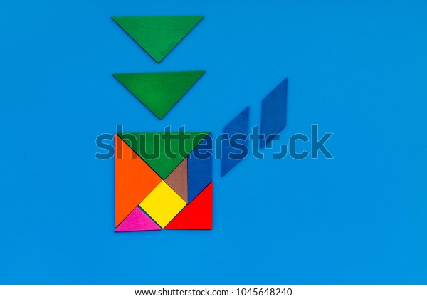 Business solutions,\
success and strategy. Puzzle with paper pieces office desk blue\
background top view\
mock-up