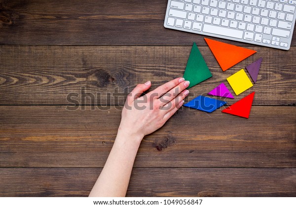 Business\
solutions, success and strategy. Puzzle with paper pieces office\
desk rustic background top view\
mock-up