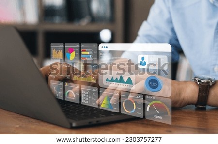 Business strategy concept for the development of the organization. Businessman use laptops to work on virtual smart digital screens, Analyze statistical Marketing data,Data management [[stock_photo]] © 
