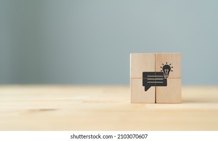 Business strategy from customer feedback and suggestion concept.  Customer centric. Team brainstrom and strategy planning. Wooden cube with feedback, idea, strategy symbols on grey backaground. Banner - Shutterstock ID 2103070607