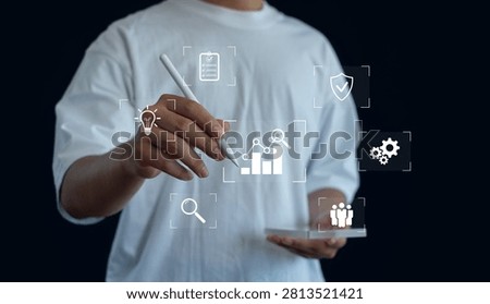 Business strategy and performance analytics concept featuring a professional interacting with virtual business icons, highlighting data analysis, process management, productivity, innovation, growth.