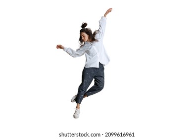 Business Style, Dynamic Portrait Of Beautiful Young Woman In Casual Wear Moves Isolated On White Background. Flexible Female Ballerina, Contemporary Dancer Weightless Moves. Art, Motion, Action