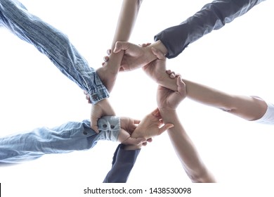 Business  Success Team Which Hand Of The Work Force Combine Power Tag Team With Light And Group Of Diversity People Hand Assembly High Five Together For Good Teamwork.