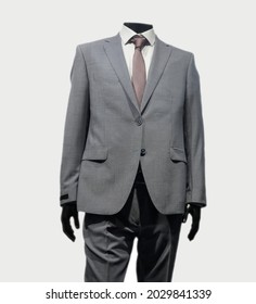 Business Suits On Shop. One Mannequin  High Fashion Retail Display. Isolated On White Background. 