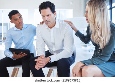 Business, Support Group And Man At The Office In Depression With Supportive Colleagues At The Workplace. Male Employee With Mental Health Problems In Divorce, Grief Or Loss With Helpful Coworkers.