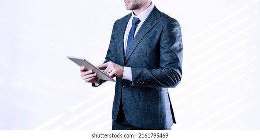 Business Tablet Isolated. Young Business Man Analyzing Economic Growth Graph Chart And Data Sales. Digital Marketing Technology With Copy Space