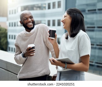 Business talk mixed with a little chit-chat. Shot of two businesspeople drinking coffee together outside an office. - Powered by Shutterstock