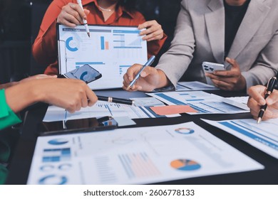 Business Team Analyzing Financial Data in Modern Office