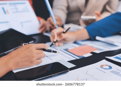 Business Team Analyzing Financial Data in Modern Office