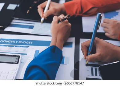 Business Team Analyzing Financial Data in Modern Office