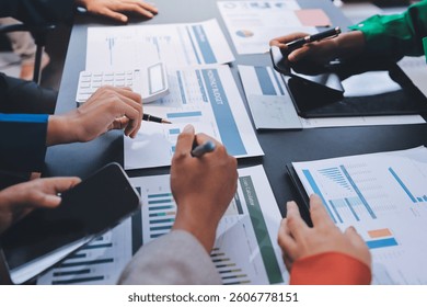 Business Team Analyzing Financial Data in Modern Office