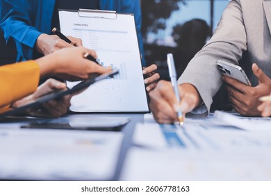 Business Team Analyzing Financial Data in Modern Office