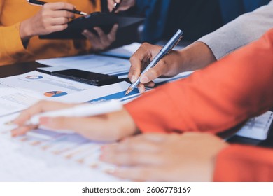 Business Team Analyzing Financial Data in Modern Office