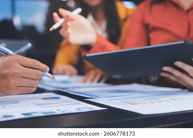 Business Team Analyzing Financial Data in Modern Office