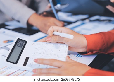 Business Team Analyzing Financial Data in Modern Office