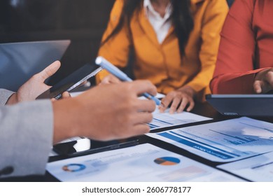 Business Team Analyzing Financial Data in Modern Office
