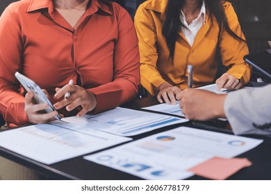 Business Team Analyzing Financial Data in Modern Office