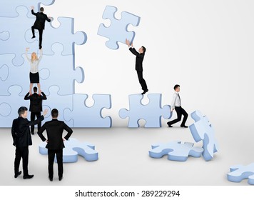 Business Team Building Puzzle Pieces Together