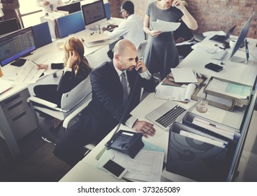 Business Team Busy Working Workplace Concept - Powered by Shutterstock