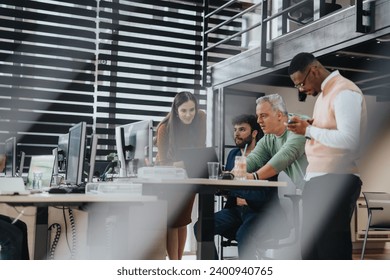 Business team collaborates in an office, strategizing for business expansion, profit growth, and market analysis. They discuss sales and financial statistics for sustainability and success.