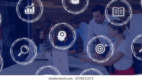 Business team collaborating at table with data processing image overlaid. Teamwork, collaboration, brainstorming, data analysis, technology, innovation