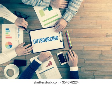 Business Team Concept: OUTSOURCING