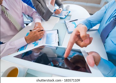 Business Team Having Roundtable Discussion At The Office Viewed Below