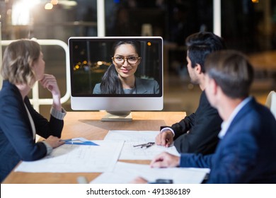 Business Team Having Video Conference In The Conference Room