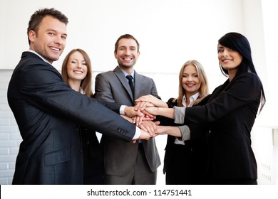 Business Team Joining Hands Together