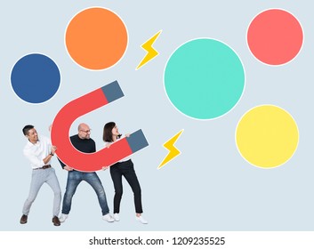 Business team with a large magnet