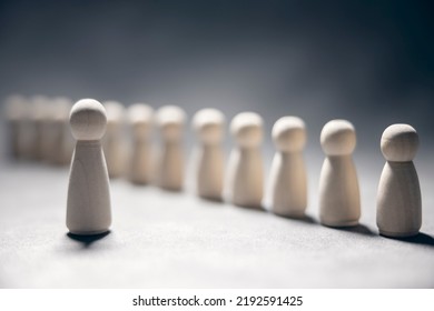 Business team leadership with one person standing out from the crowd with motivation speech concept - Shutterstock ID 2192591425