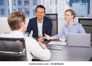 Business Team at Meeting in Office