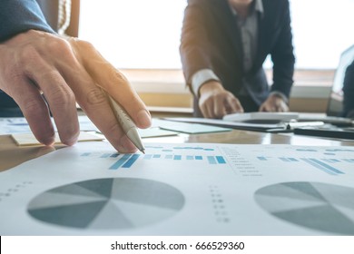 Business team meeting present. secretary presentation new idea and making report to professional investor with new finance project plan during discussion at meeting - Shutterstock ID 666529360