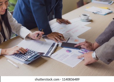 Business team meeting present.professional investor working with new startup project. Finance managers task.Digital tablet laptop computer design smart phone  calculator - Shutterstock ID 1140836489