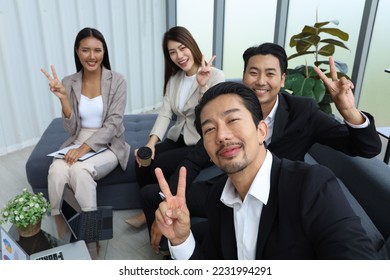 Business team meeting and relaxing  while selfie or take picture together in office - Shutterstock ID 2231994291