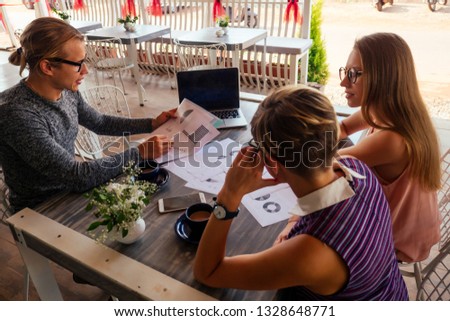 Similar – Image, Stock Photo Young women looking road map with 4×4 on background