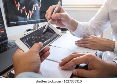 Business team on meeting to planning investment trading project and strategy of deal on a stock exchange with partner, financial and accounting concept, collaborative teamwork analyze data.