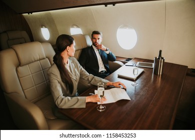 Business Team On The Private Jet