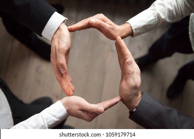 Business Team People Join Hands Forming Circle, Business Protection, Unity In Care And Support, Shared Corporate Responsibility, Help In Teamwork, Synergy Trust Safety Concept, Close Up Top View