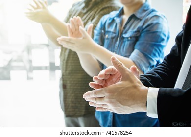 Business team success. Business people hands applauding after presentation project at conference.successful meeting - Powered by Shutterstock