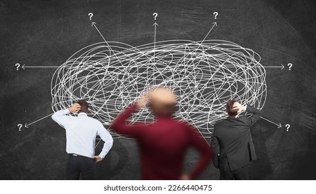 Business Team Thinking in Solving Difficult and Complex Problem Concept. Confused People Wonder at Perplexed Complex Messy Line. Teamwork and Brainstorming Idea - Shutterstock ID 2266440475