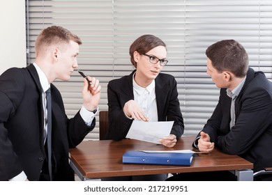 Business Team Trying To Resolve Problem At Work