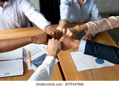 Business Team Unity. Group Of Multiethnic Colleagues Joining Fists Together During Corporate Meeting In Office, Diverse Coworkers Celebrating Successful Teamwork, Closeup Shot, High Angle View - Shutterstock ID 2079147868
