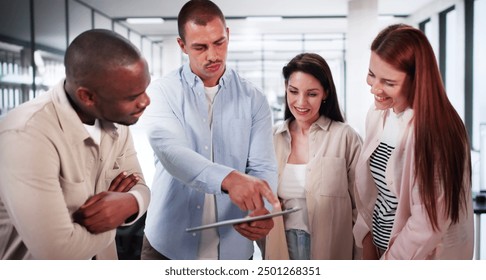 Business Team Using Tablet Technology. Standing Teamwork