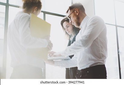 Business Team Work Process. Photo Young Professionals Crew Working With New Startup Project. Project Managers Meeting. Analyze Business Plans Laptop. Blurred Background, Film Effect