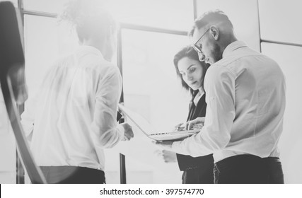 Business Team Work Process. Photo Professional Crew Working With New Startup Project. Project Managers Meeting. Analyze Business Plans Laptop. Blurred Background, Film Effect, Black White. Horizontal