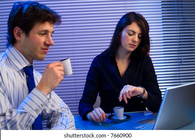 Business Team Working Late In Office.