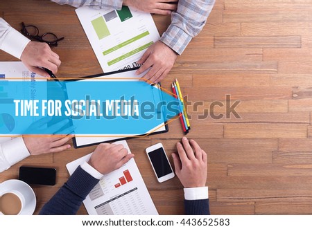 BUSINESS TEAM WORKING OFFICE TIME FOR SOCIAL MEDIA DESK CONCEPT